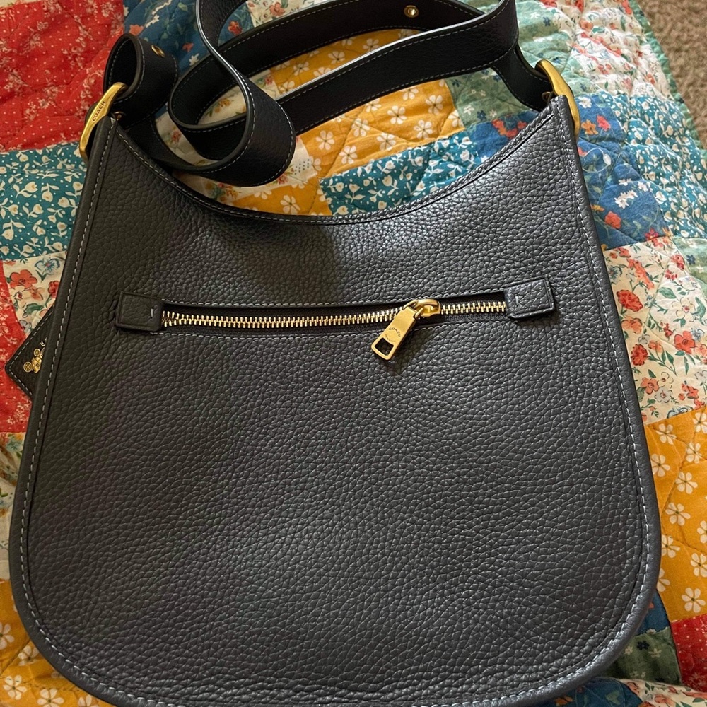 Coach legacy bag in midnight navy.